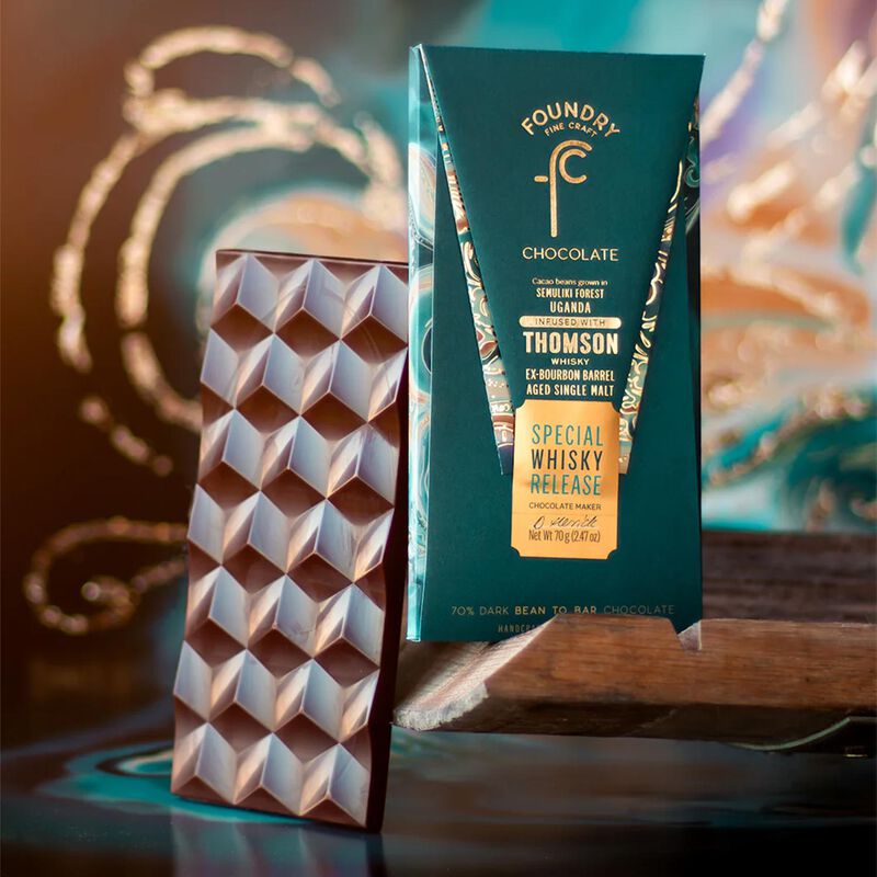 Foundry Uganda x Thomson ex-Bourbon Barrel-aged Whisky 70% Dark Choc 70g image number 1