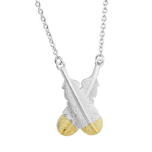 Little Taonga Huia Crossed Feather Necklace Silver With Gold Tips