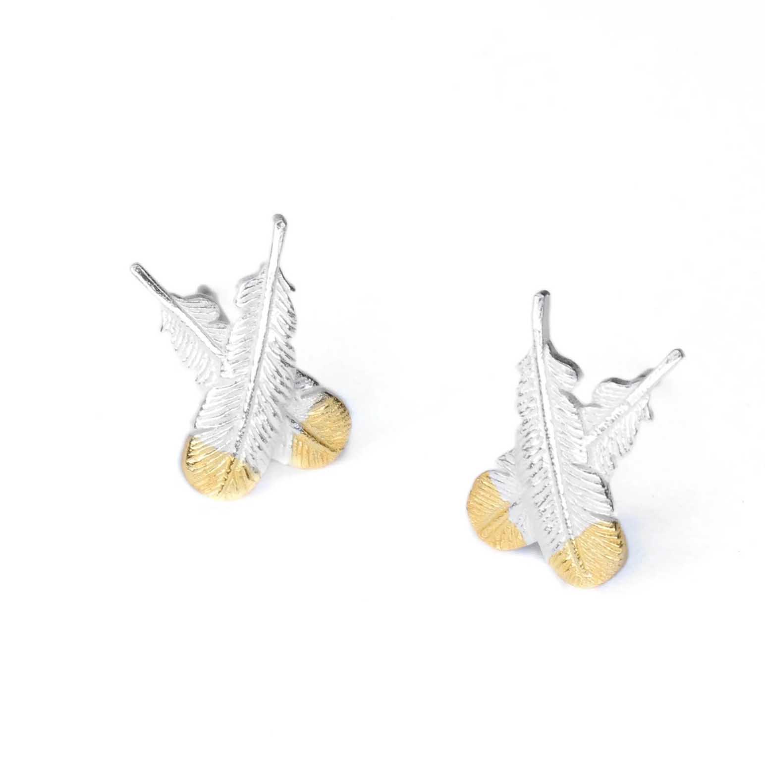 Little Taonga Huia Crossed Feather Earrings Silver With Gold Tips