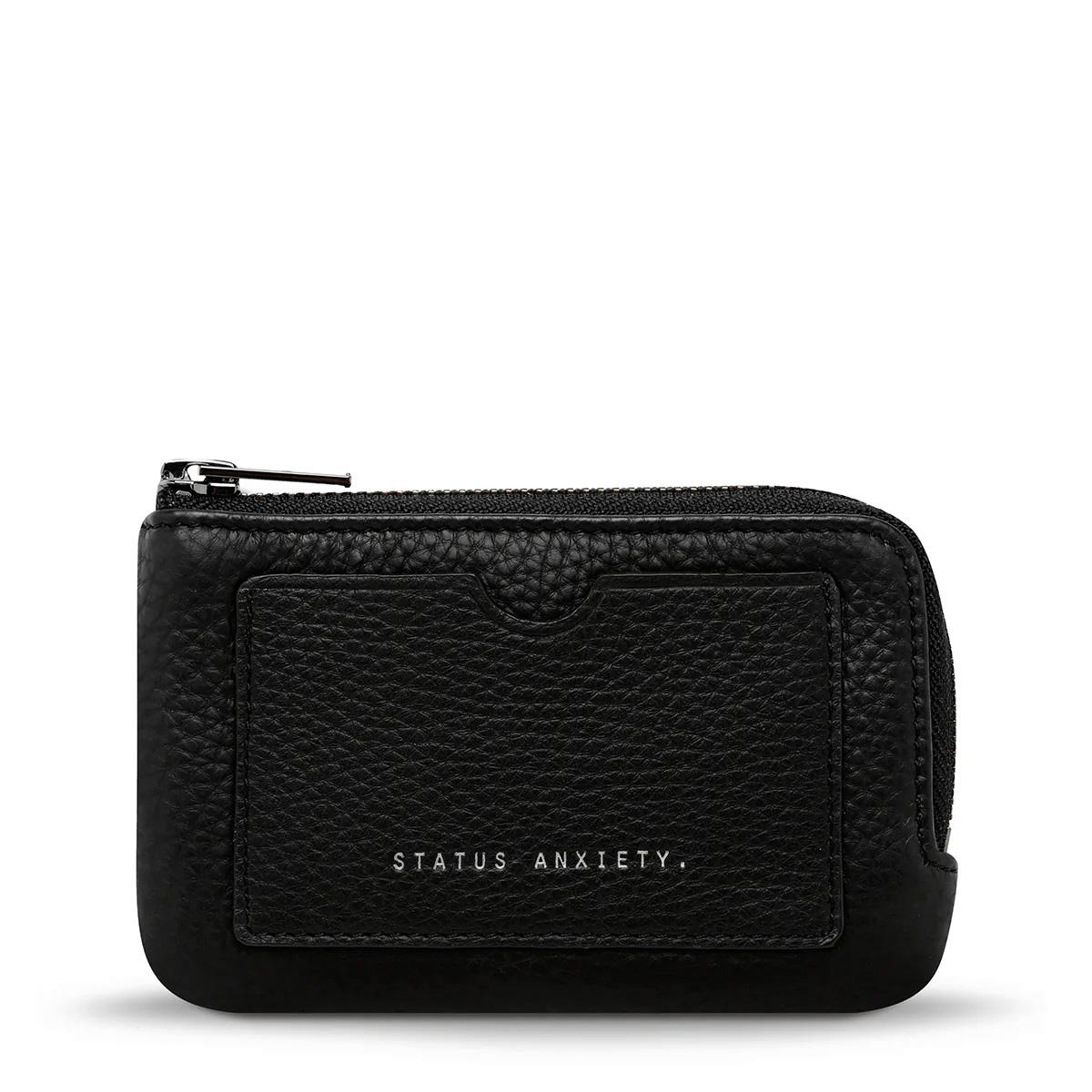 Status Anxiety Left Behind Wallet